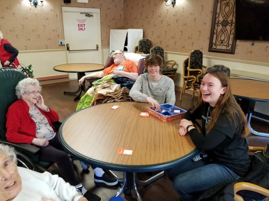 Nikki Rooseboom laughs with her great company at Life Care Center in Plainwell.  